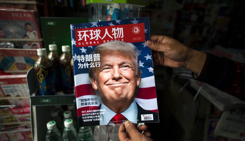 TOPSHOT - A copy of the local Chinese magazine Global People with a cover story that translates to "Why did Trump win" is seen with a front cover portrait of US president-elect Donald Trump at a news stand in Shanghai on November 14, 2016.   Chinese President Xi Jinping and US president-elect Donald Trump agreed November 14 to meet "at an early date" to discuss the relationship between their two powers, Chinese state broadcaster CCTV said.  / AFP / JOHANNES EISELE        (Photo credit should read JOHANNES EISELE/AFP/Getty Images)