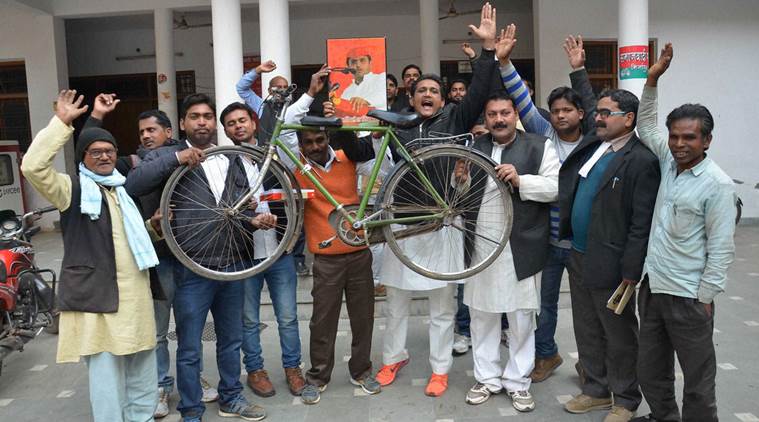 Mirzapur: Supporters celebrate after EC's recognition of  to the Akhilesh Yadav faction as the Samajwadi Party and allotting 'bicycle' symbol to it in Mirzapur on Tuesday. PTI Photo(PTI1_17_2017_000186B) *** Local Caption ***